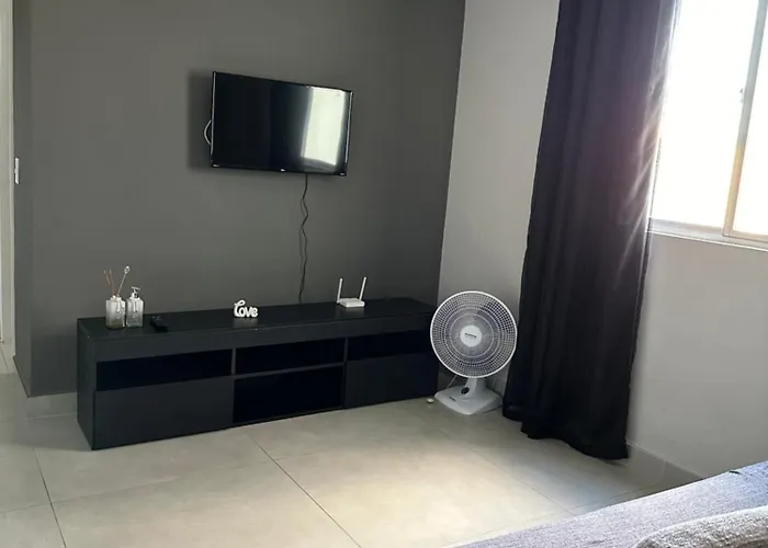 Apartamento novo ao lado do Rio Centro!